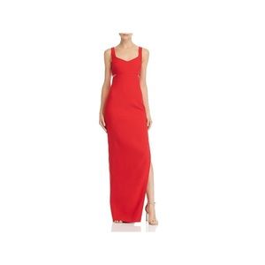 Red gown with side cut outs and side slit up the leg